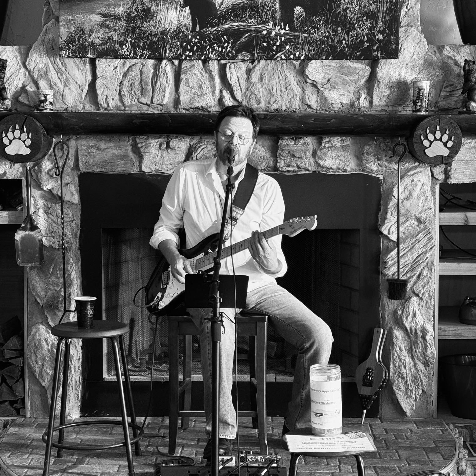 scottie kemp playing guitar and singing